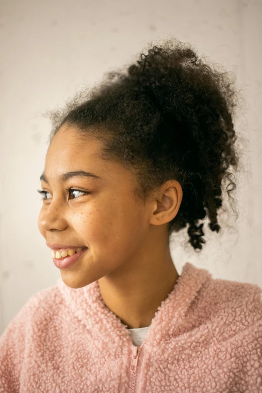 a young girl brushing her teeth with a toothbrush, trending on pexels, happening, portrait of willow smith, mixed race, smiley profile, her hair pinned up