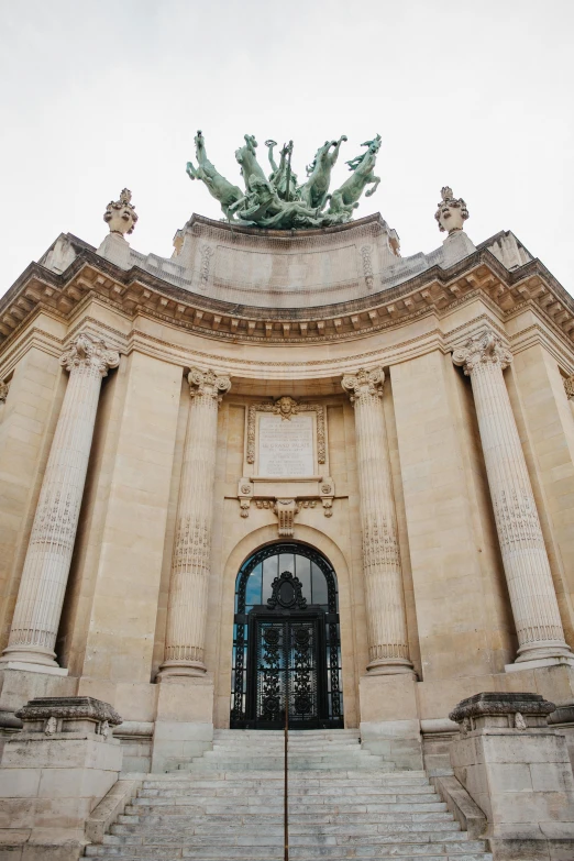 a building with a statue on top of it, unsplash, paris school, entrance, lots de details, detail shots, wide view