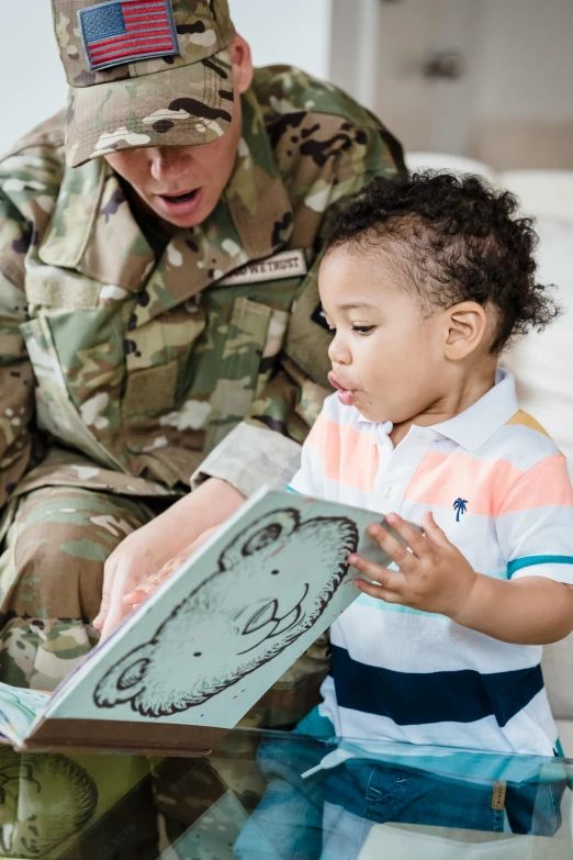 a soldier reading a book to a child, a portrait, pexels contest winner, square, toddler, patterned, solid coloring