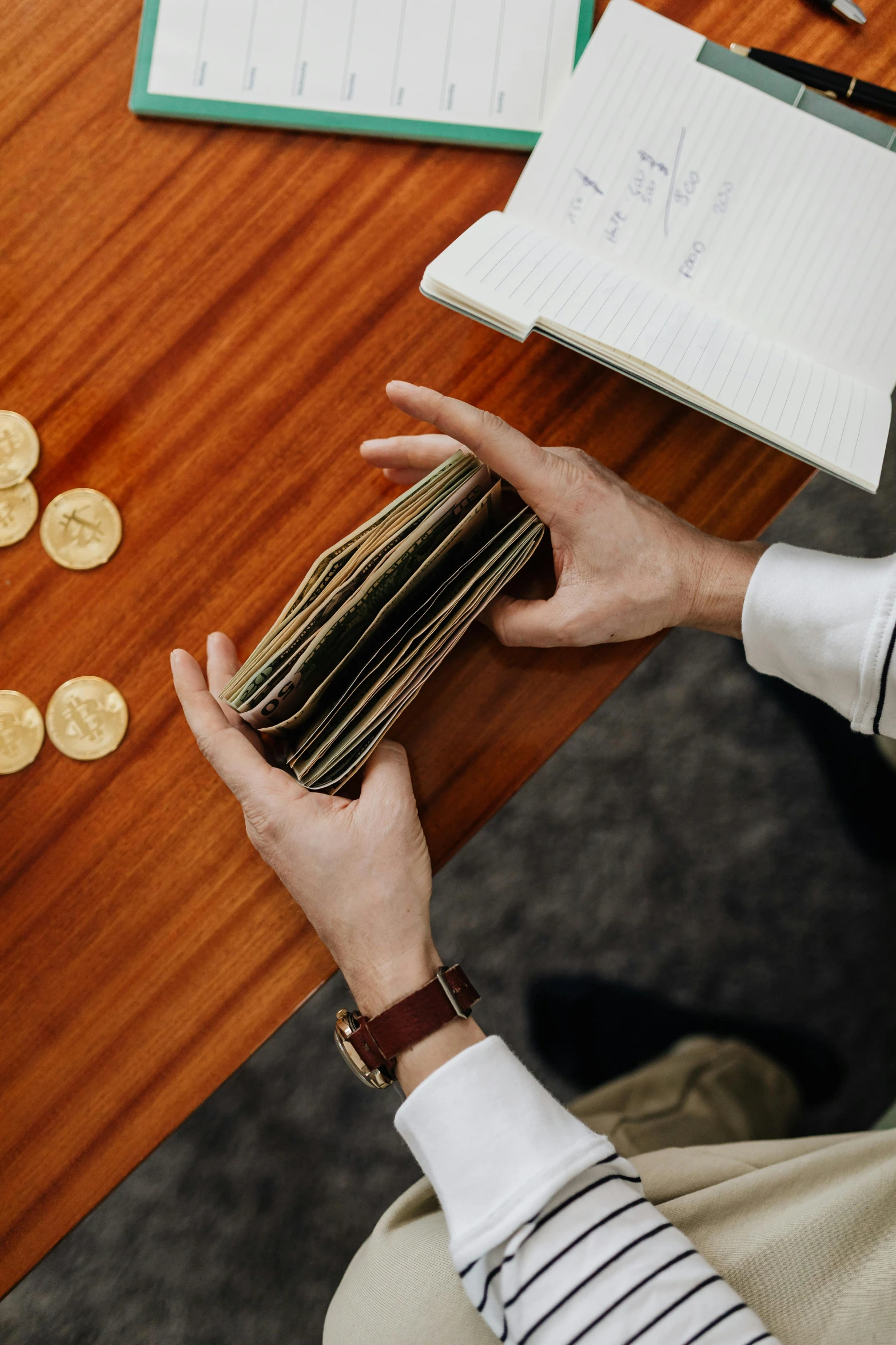 a man sitting at a table with a stack of coins, pexels contest winner, renaissance, pockets, official screenshot, album, brittney lee