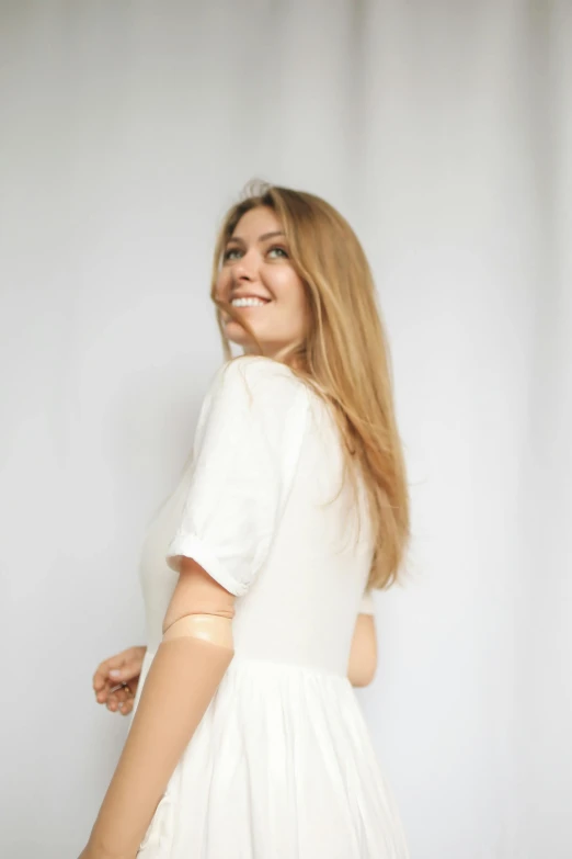 a woman in a white dress posing for a picture, head bent back in laughter, official product image, pokimane, large)}]