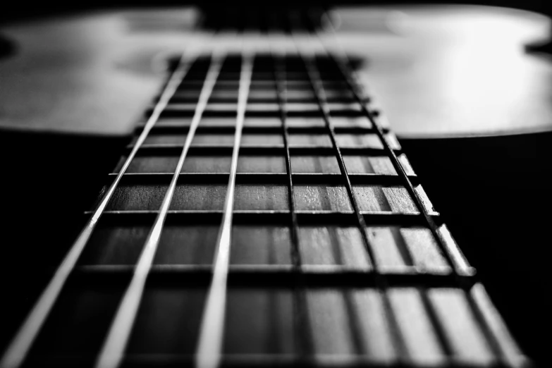 a black and white photo of a guitar, by Matthias Weischer, pexels, square lines, macro perspective, low angle!!!!