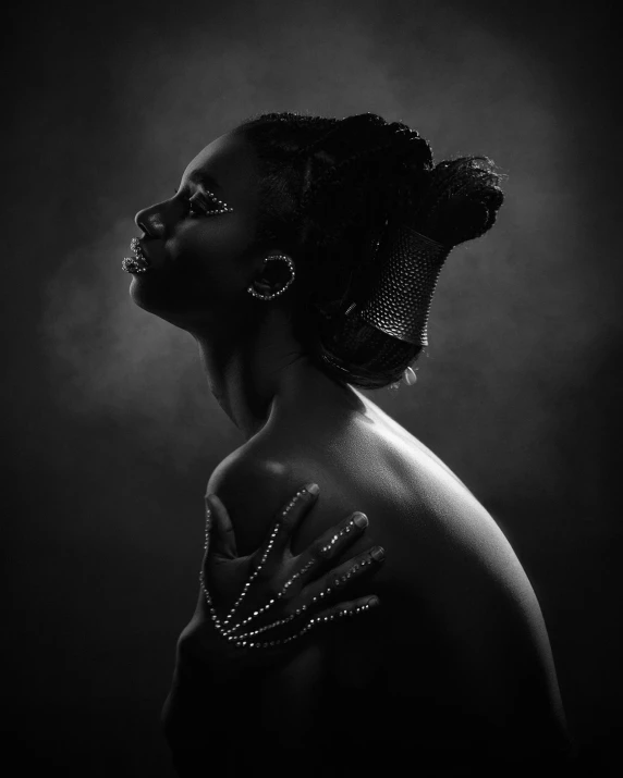 a woman in a black and white photo, pexels contest winner, art photography, dark skin female goddess of love, alternate album cover, black human spine, lensculture portrait awards