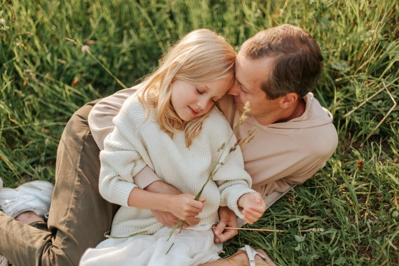 a man and a little girl laying in the grass, by Emma Andijewska, pexels contest winner, renaissance, soft glow, blond, 15081959 21121991 01012000 4k, tan