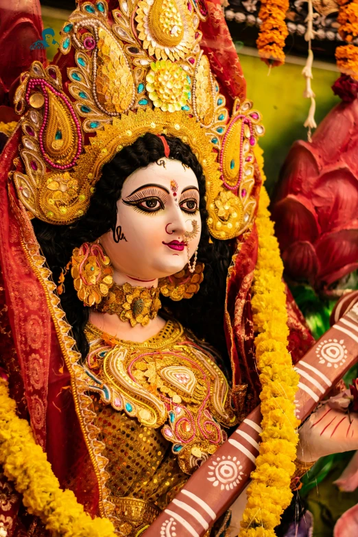 a close up of a statue of a woman, a statue, bengal school of art, ornate mask and fabrics, queen of heaven, and, square