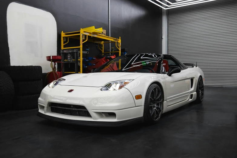 a white sports car parked in a garage, a portrait, inspired by Hiroshi Honda, unsplash, fully armored, honda nsx, 15081959 21121991 01012000 4k, instagram picture