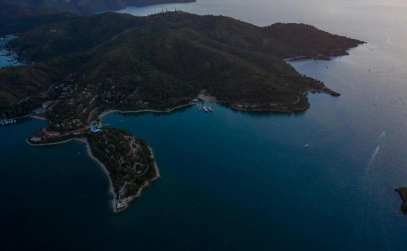 an aerial view of a large body of water, by Tobias Stimmer, pexels contest winner, hurufiyya, peaceful evening harbor, hills and ocean, turkey, picton blue