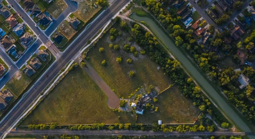 a bird's eye view of a residential area, an album cover, by Adam Marczyński, pexels contest winner, happening, at a park, wide open space, 15081959 21121991 01012000 4k, cementary