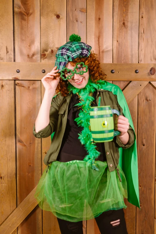 a woman dressed up as a st patrick's day costume, photo booth, cider-man, promo image, beautiful surroundings