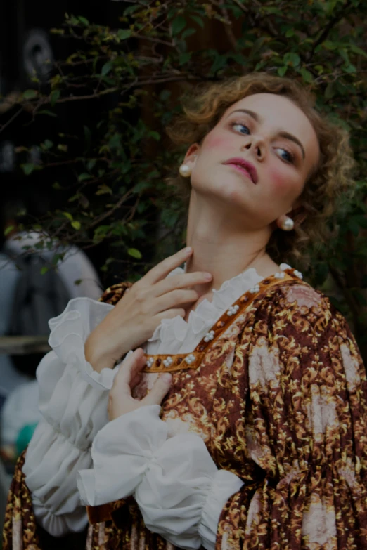 a woman in a brown and white dress posing for a picture, inspired by Lucas Cranach the Elder, unsplash, renaissance, kaya scodelario, square, performance, wearing a blouse