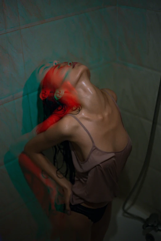 a woman in a bathing suit standing in a shower, inspired by Elsa Bleda, unsplash contest winner, renaissance, red and green lighting, distorted pose, a young asian woman, color picture