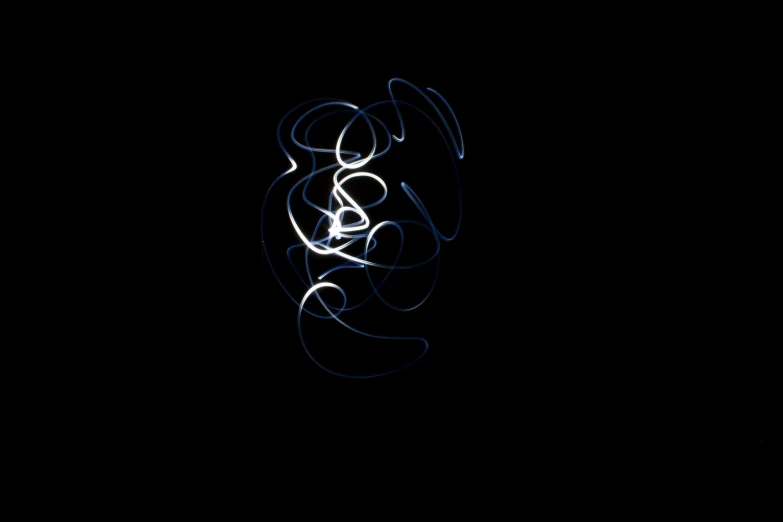 a close up of a light painting on a black background, generative art, drawn in microsoft paint, dramatic white and blue lighting, shot with sigma f/ 4.2, caligraphy