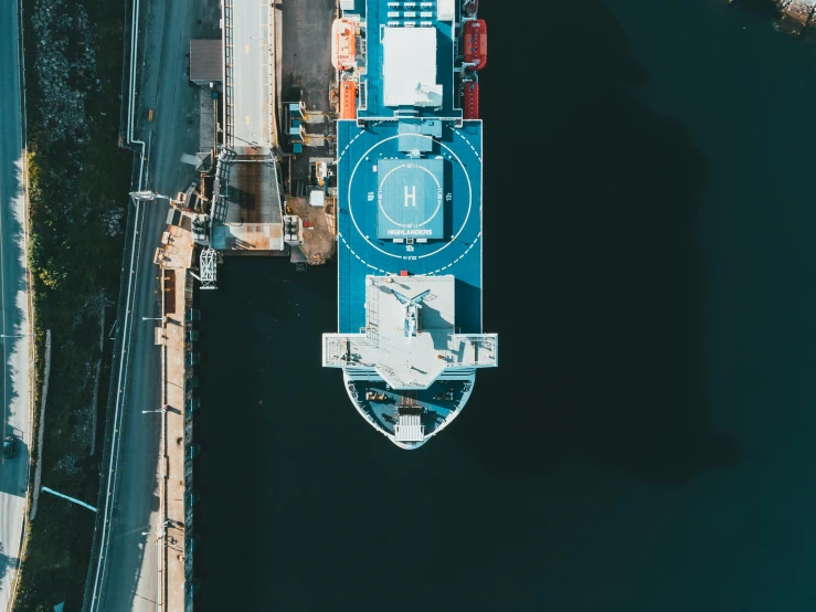 a large boat in the middle of a body of water, pexels contest winner, high angle security camera feed, shipping docks, ilustration, portrait photo