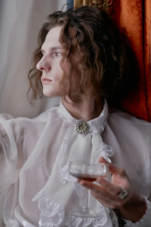 a woman in a white shirt holding a glass of wine, an album cover, inspired by Jan Lievens, renaissance, delicate androgynous prince, adam ondra, wearing ornate silk clothes, a close up shot