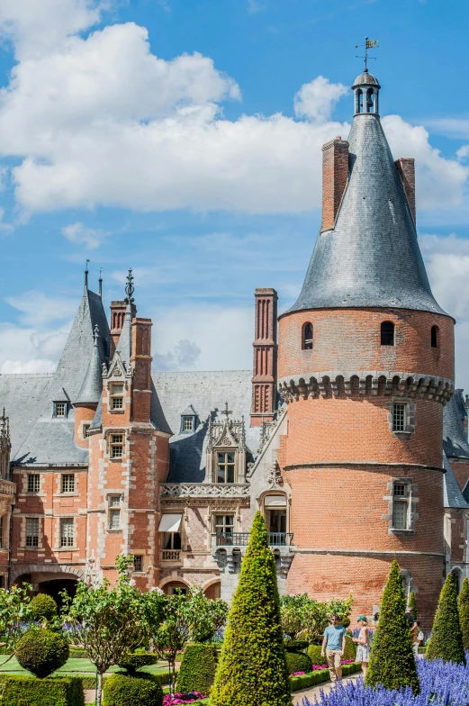 a large castle sitting on top of a lush green field, an album cover, inspired by Jean Fouquet, pexels contest winner, ornate tiled architecture, 2 5 6 x 2 5 6 pixels, detail shots, chaumet