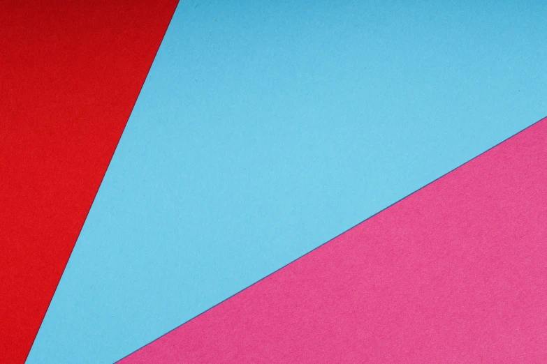 a pair of scissors sitting on top of a piece of paper, an album cover, inspired by Malevich, trending on pexels, color field, magenta and crimson and cyan, medium close-up shot, blue and red, triangles