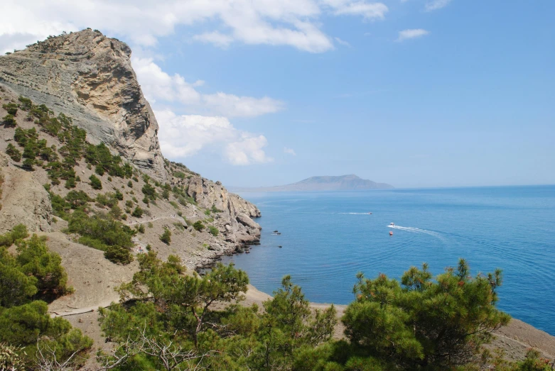 a view of the ocean from the top of a hill, by Muggur, les nabis, greek nose, conde nast traveler photo