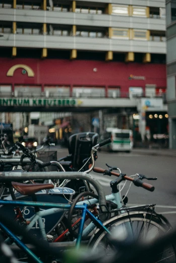 a bunch of bikes parked on the side of a street, by Niko Henrichon, unsplash, square, market setting, frederik heyman, touring