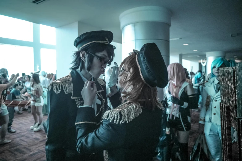 a couple of people standing next to each other, a photo, inspired by Okumura Masanobu, renaissance, anime convention, alucard, 33mm photo, fan favorite