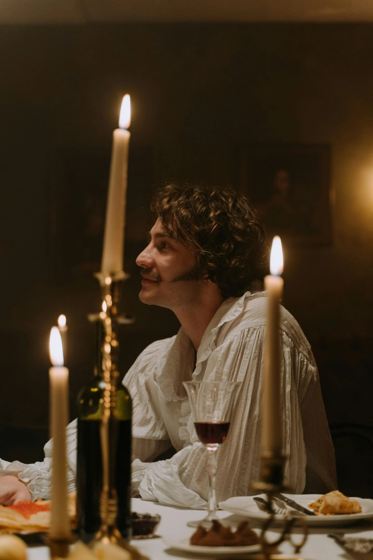 a man and a woman sitting at a dinner table, inspired by Karl Bryullov, unsplash contest winner, renaissance, white candles, adam driver behind, ( ( theatrical ) ), slide show