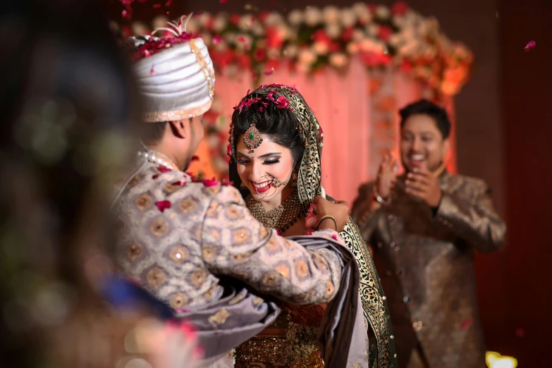 a man standing next to a woman in a wedding dress, pexels, hurufiyya, bollywood, celebrating, thumbnail, bangladesh