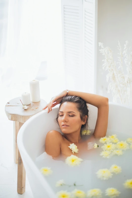 a woman laying in a bathtub filled with flowers, trending on pexels, crisp clean shapes, sanctuary, lagoon, in bathroom