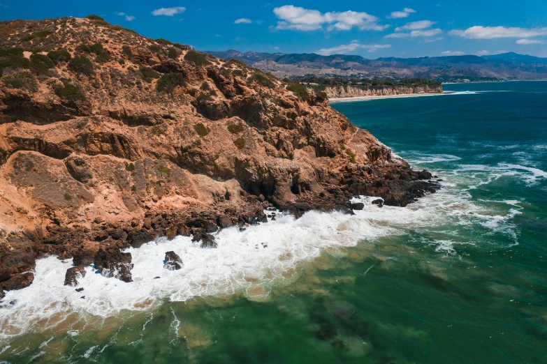 a large body of water next to a rocky shore, pexels contest winner, renaissance, malibu canyon, clean 4 k, flat lay, icon