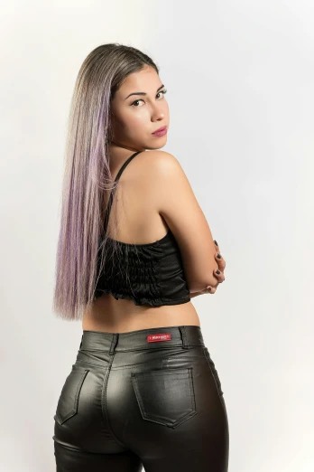 a woman with purple hair wearing black leather pants, trending on pexels, trending on mentalray, peruvian looking, 9 0 mm studio photograph tiny, gradient hair