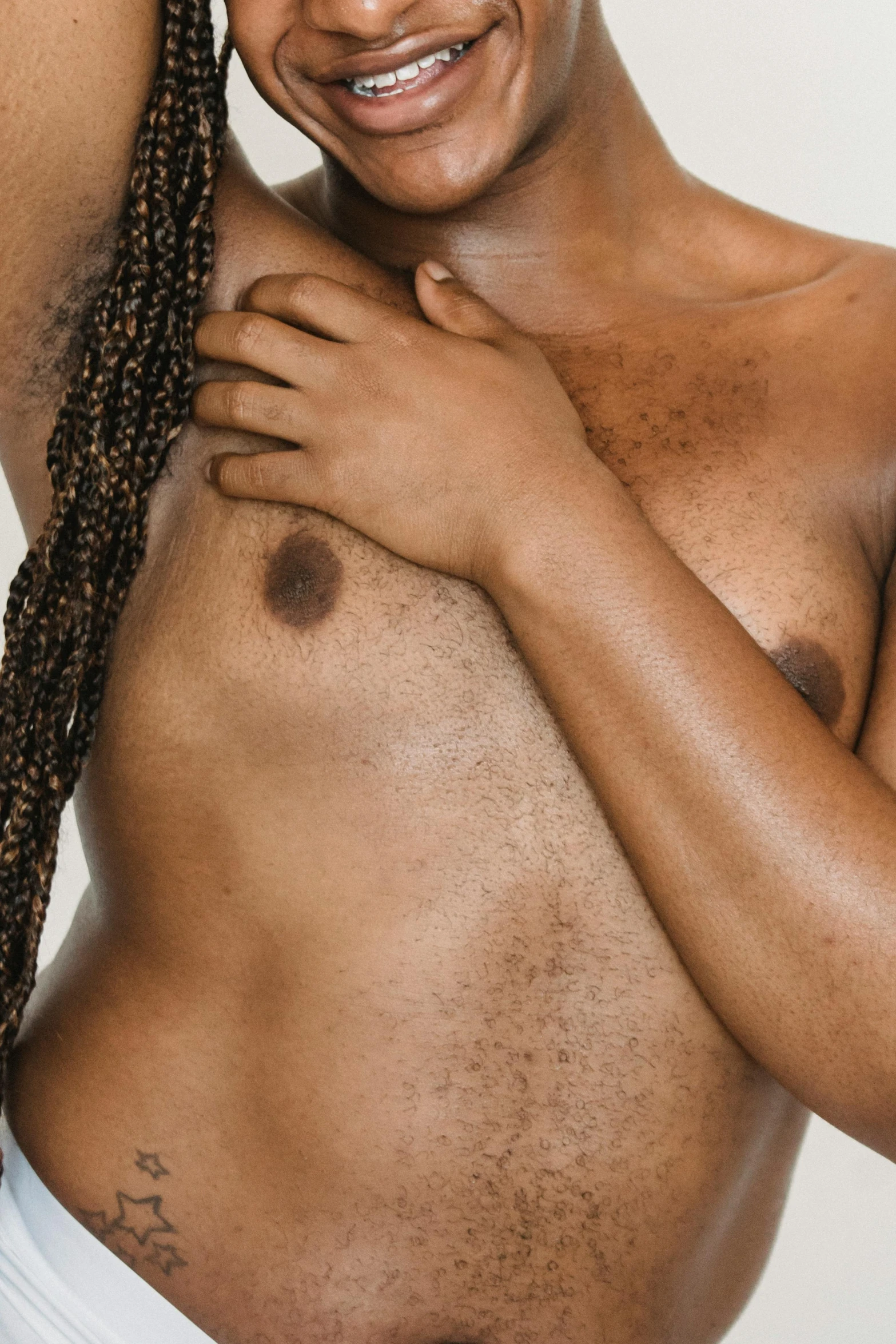 a man with dreadlocks posing for a picture, an album cover, by Jessie Alexandra Dick, trending on pexels, happening, nipple, ( ( brown skin ) ), hegre, partially male hairy torso