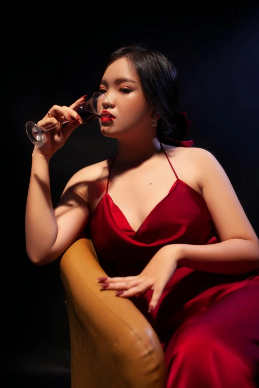 a woman in a red dress smoking a cigarette, pexels contest winner, holding wine bottle, beautiful asian woman sitting, gif, bbwchan