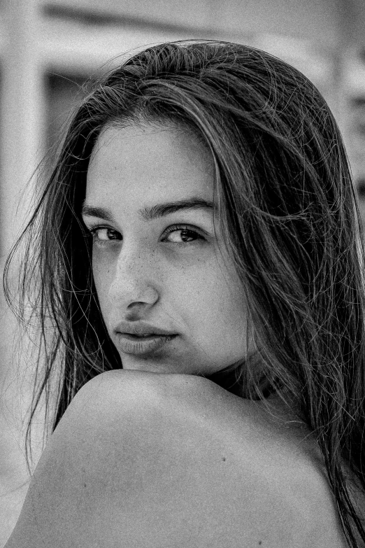 a black and white photo of a woman with long hair, by Daniel Gelon, young cute face, face like gal gadot, virginie ropars, 🤤 girl portrait