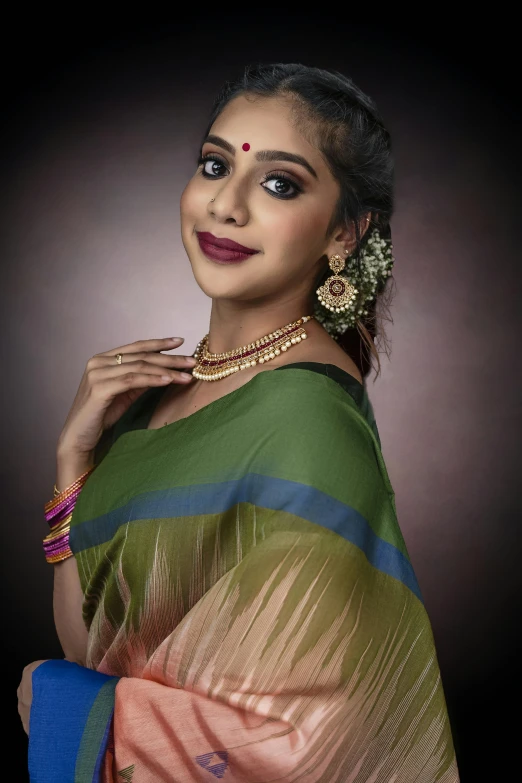 a woman in a sari posing for a picture, trending on cg society, olive green, studio!! portrait lighting, promo image, square