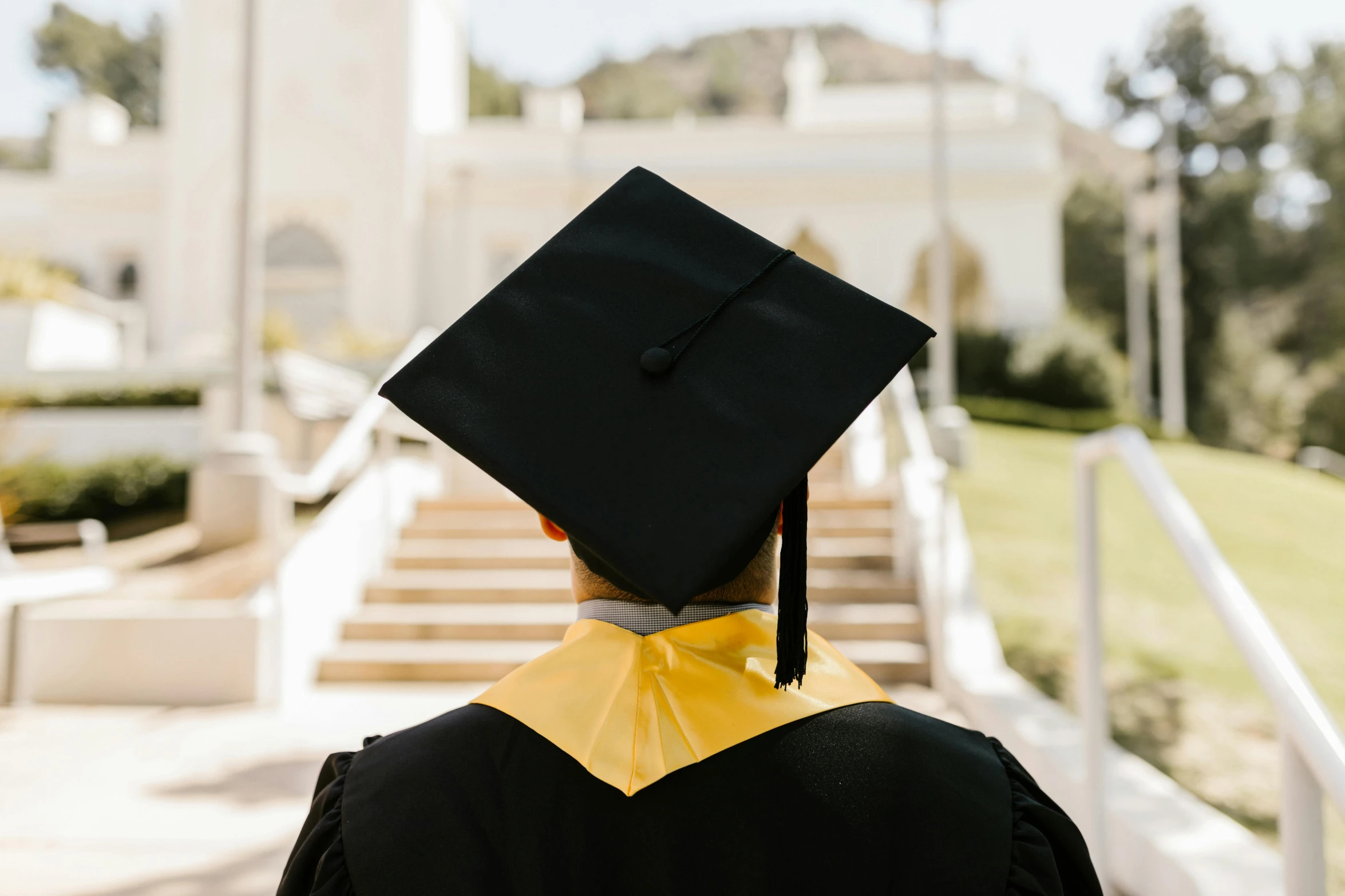 a person wearing a graduation cap and gown, pexels, instagram post, background image, rectangle, stately robes