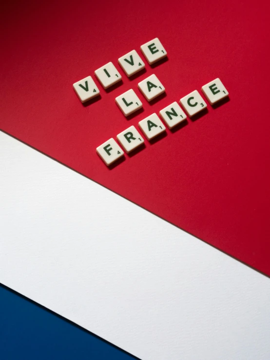 the word vive la france spelled with scrabbles on a red, white and blue background, an album cover, trending on unsplash, figuration libre, 🚿🗝📝