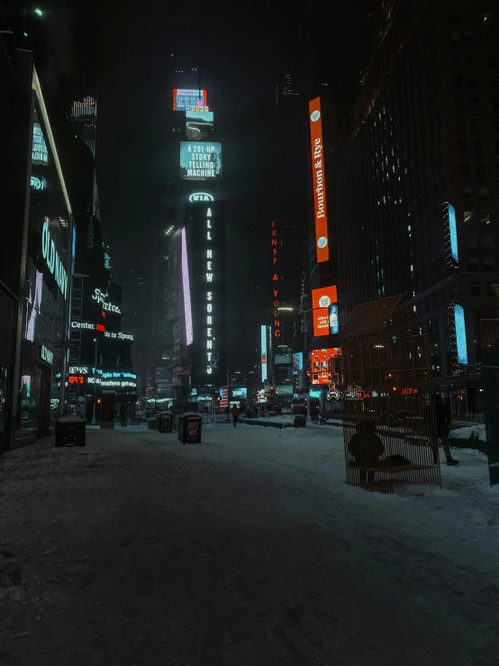 a city street filled with lots of traffic at night, a matte painting, inspired by Elsa Bleda, pexels contest winner, hyperrealism, snow wasteland, standing in time square, album cover, 90s photo