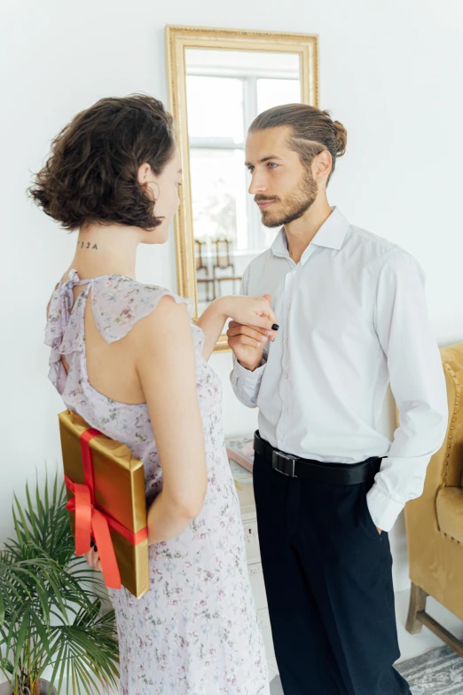 a man standing next to a woman in a dress, complaints, profile image