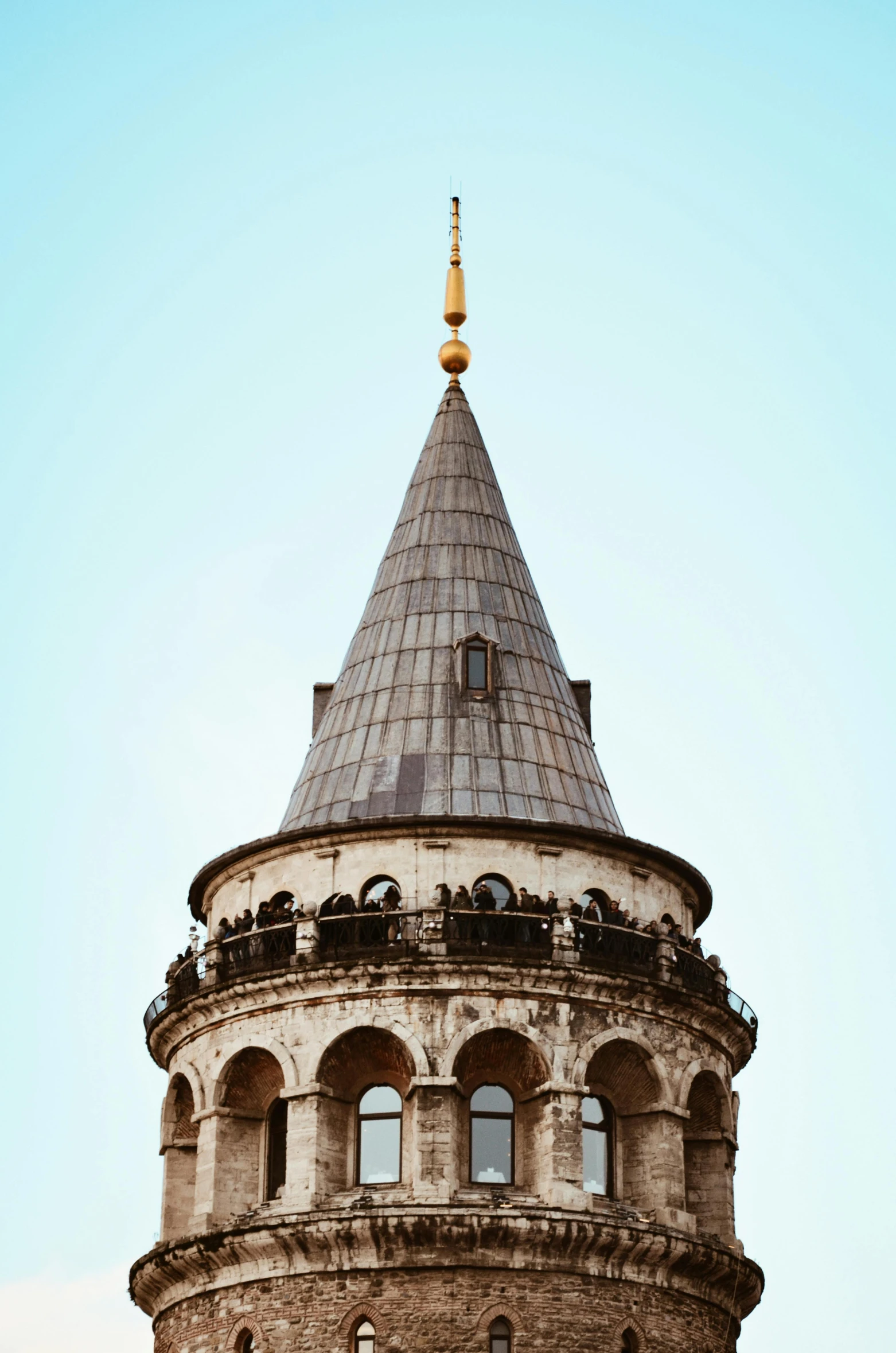 a tall tower with a clock on top of it, inspired by Altoon Sultan, trending on pexels, art nouveau, rounded roof, 2 5 6 x 2 5 6, turkey, round-cropped