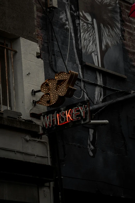 a sign that is on the side of a building, inspired by William Harnett, pexels contest winner, whiskey, profile image, nightlife, trinkets