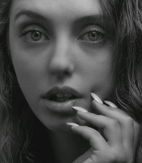 a black and white photo of a woman with long hair, inspired by irakli nadar, pexels contest winner, hyperrealism, gorgeous young alison brie, beautiful hands, pouty, monochrome 3 d model