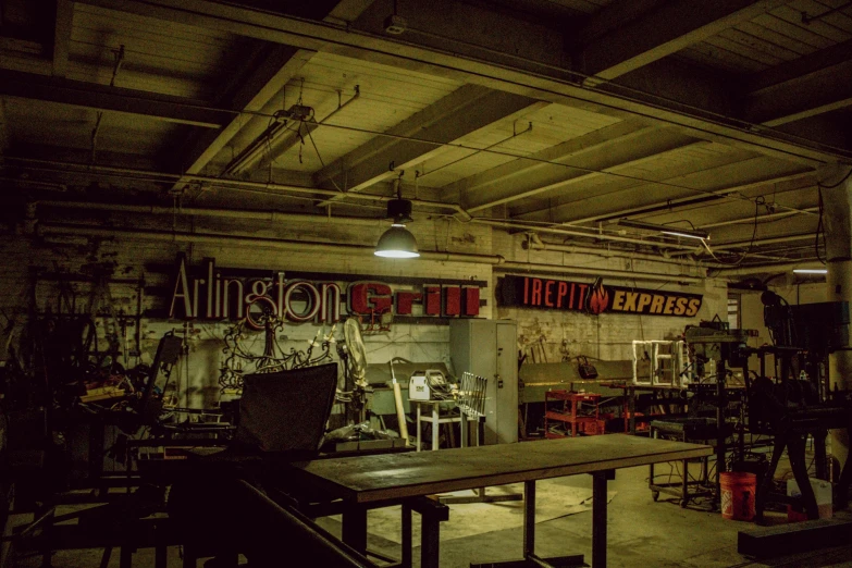 a room filled with lots of tables and chairs, a silk screen, by Washington Allston, unsplash, dimly lit underground dungeon, scrap metal on workbenches, thumbnail, chicago