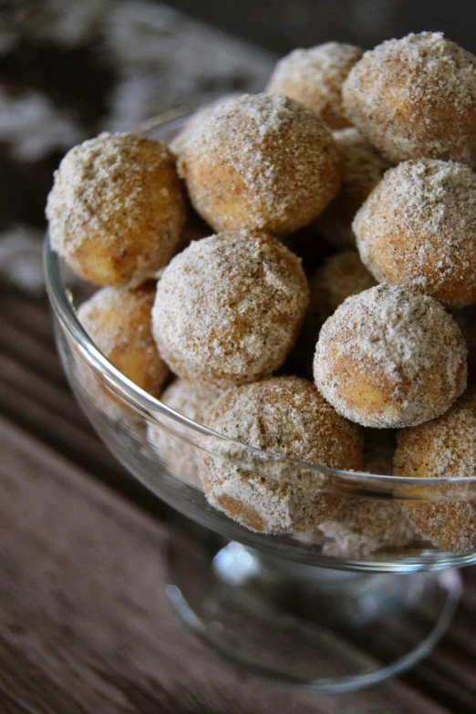 a glass bowl filled with donuts covered in powdered sugar, by Linda Sutton, renaissance, high grain, thumbnail, rustic, mini