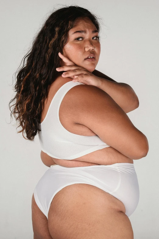 a woman in a white underwear posing for a picture, very large bosum, promo image, profile shot, bbwchan