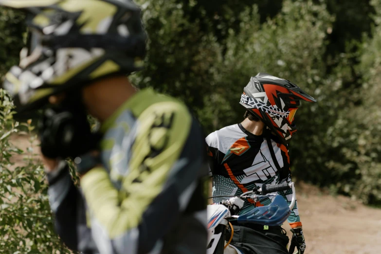 a couple of men standing next to each other on a dirt road, action sports, avatar image, hq ”, zoomed in shots