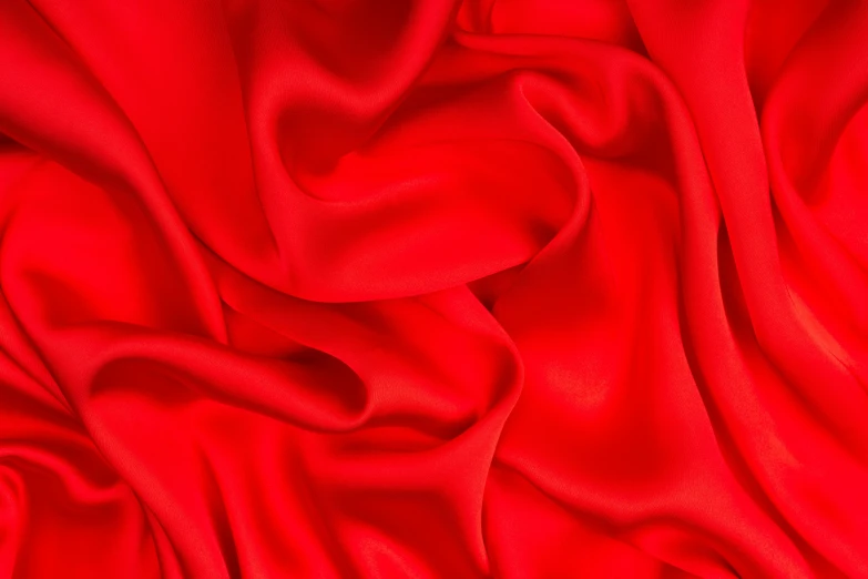 a close up view of a red fabric