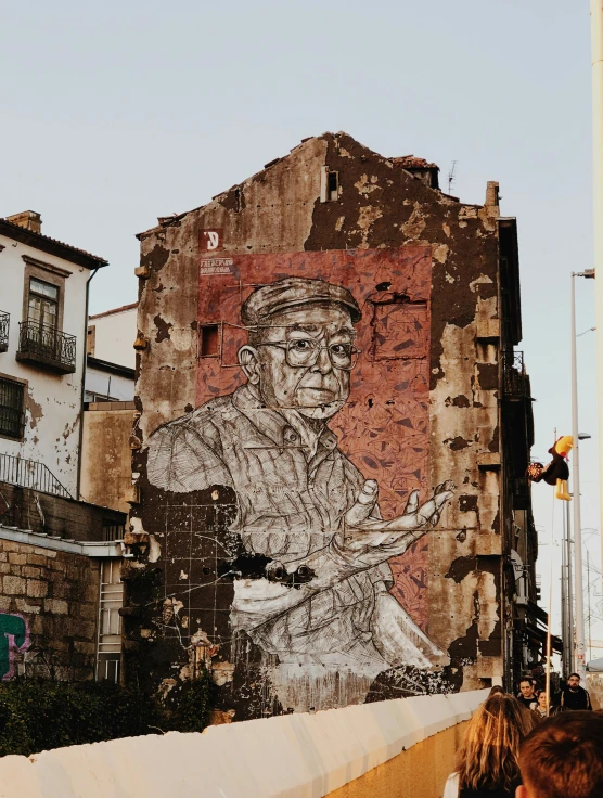 a mural of a baseball player on the side of a building, inspired by William Kentridge, pexels contest winner, portugal, portrait photo of an old man, weathered drawing, 🚿🗝📝