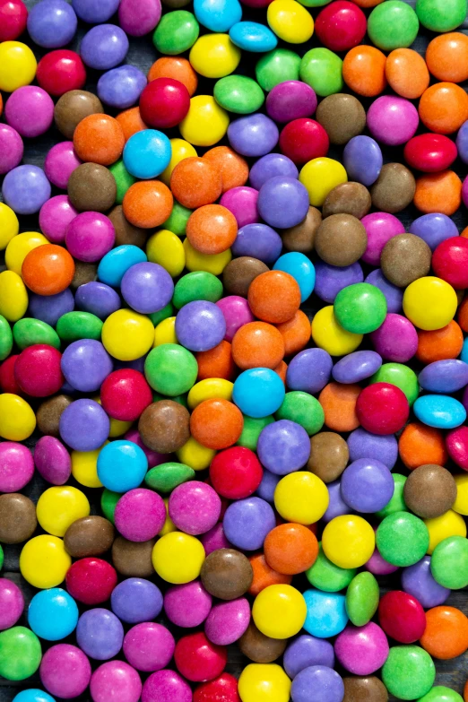 a pile of multicolored chocolate candies, an album cover, inspired by Damien Hirst, pexels, pop art, 2 5 6 x 2 5 6 pixels, dots, cereal, rainbow coloured rockets