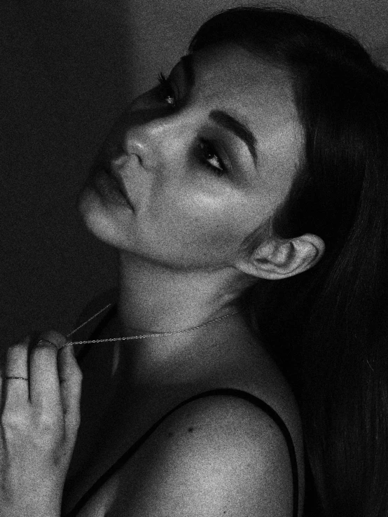 a black and white photo of a woman, a black and white photo, by Dimitre Manassiev Mehandjiysky, soft devil queen madison beer, arm around her neck, dramatic lighting))), portrait of maci holloway