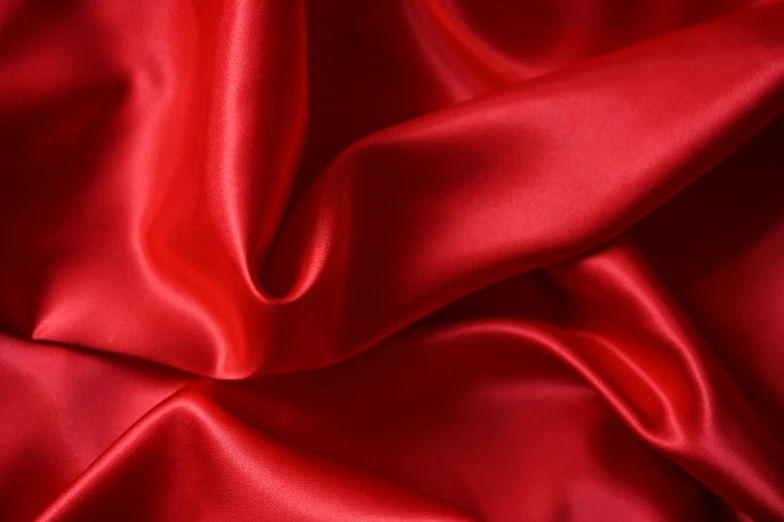a close up of a red satin fabric, looking towards the camera, product shot, colours, rectangle