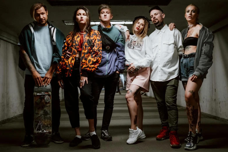 a group of people standing next to each other, a portrait, pexels contest winner, antipodeans, with pop punk style, valeriy vegera, aurora aksnes, urban clothing