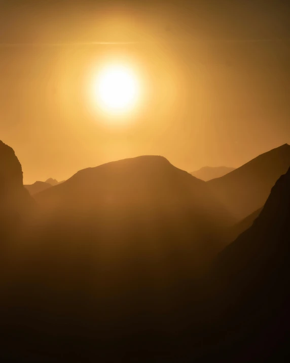 the sun is setting over a mountain range, by Sebastian Spreng, pexels contest winner, romanticism, golden mist, diffused backlight, today\'s featured photograph 4k, sweltering